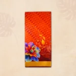 Vibrant Orange Floral Saree with Katan Paar